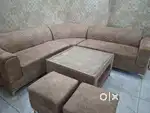 1 year old sofa set in very good condition with sofa cover and cusions