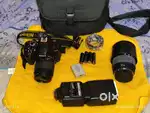 Nikon D3400 with kit and zoom lens+ flash