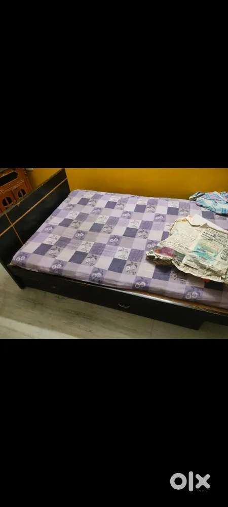 Single wooden bed with storage in good condition