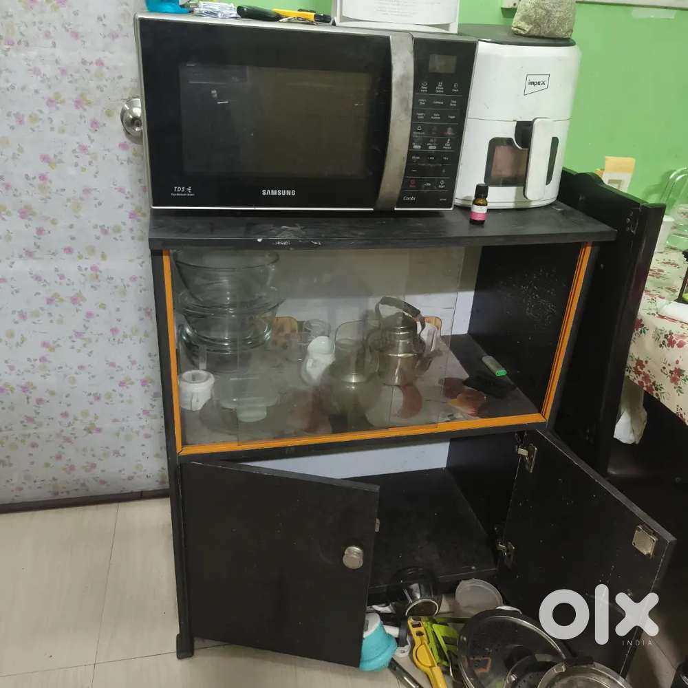 Engineering wood showcase and another showcase with puja sinhashan