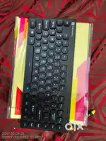 Portronics bluetooth and 2.4 GHz Keyboard with 4 months warranty left.