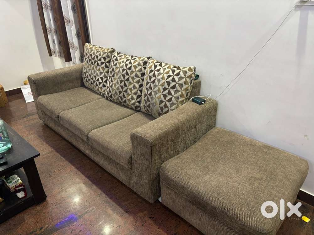 4 seater sofa with 3 big cushions and  centre table