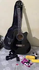 Kedence Black Acoustic guitar + free accessories ( unused guitar new )