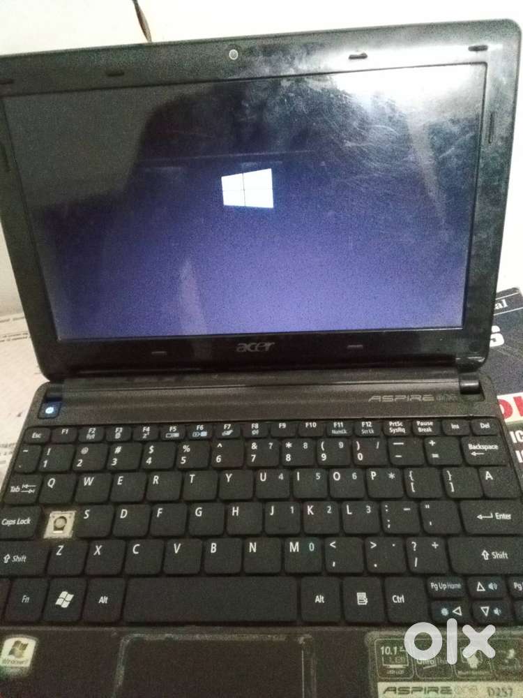 Desktop and laptop and camera and chair