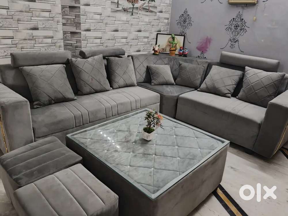 7 Seater sofa with 2 puffy in Grey colour