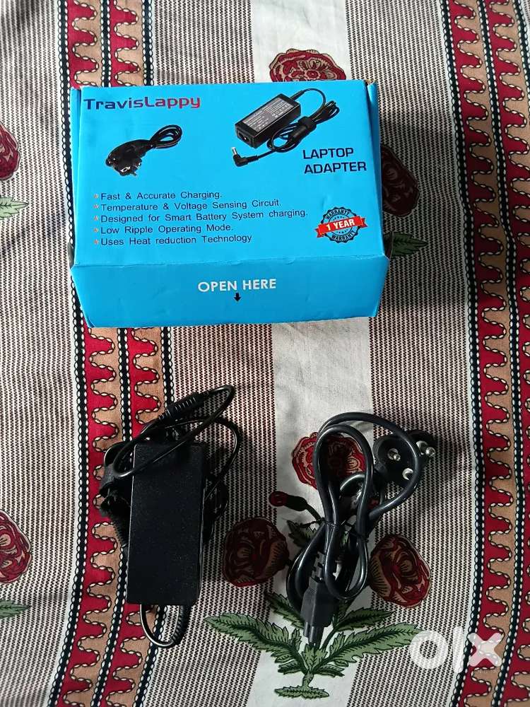 :Title: TravisLappy Laptop Adapter - Brand New, Unused, Wrong Pin