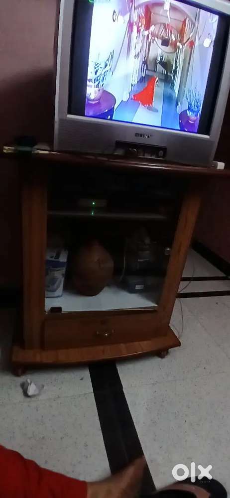 Tv with wooden table