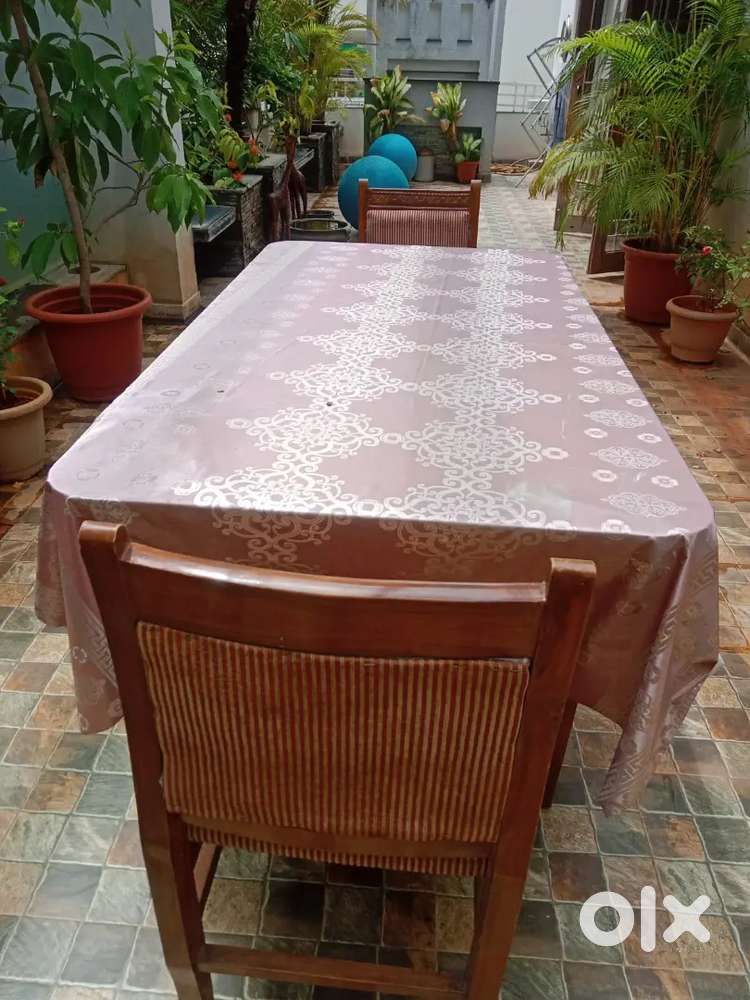 Dining table with glass top