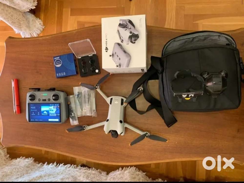 DJI Mini 4 Pro Fly More Combo Camera Drone (with RC 2 Remote)