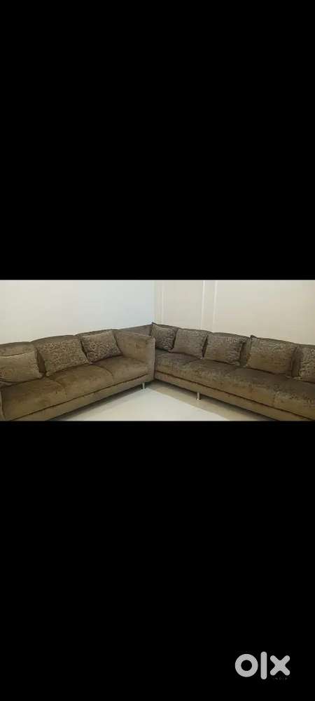8 seater sofa in good condition with table