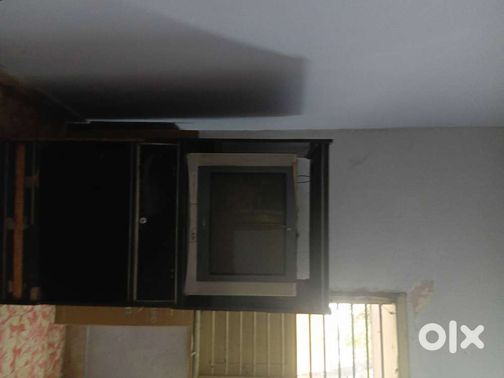 Sony TV with cabinet, 15years