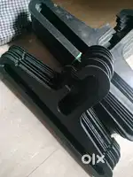 Clothes hangers. Black color Plastic. And display dolls also