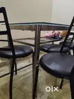 Steel Glass dinning table with iron chair..glass can be seperate