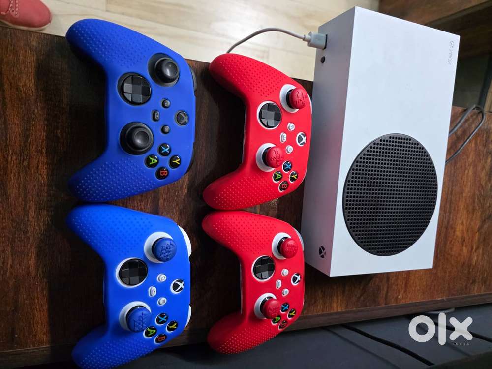 X box console with 4 remotes (with bill)