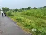 6800 sq feet corner plot on road . Road size-32 feet