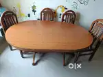 6 seater dining table with 4 chairs in good condition