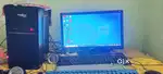 Computer Desktop along with mouse, keyboard and two wired speakers