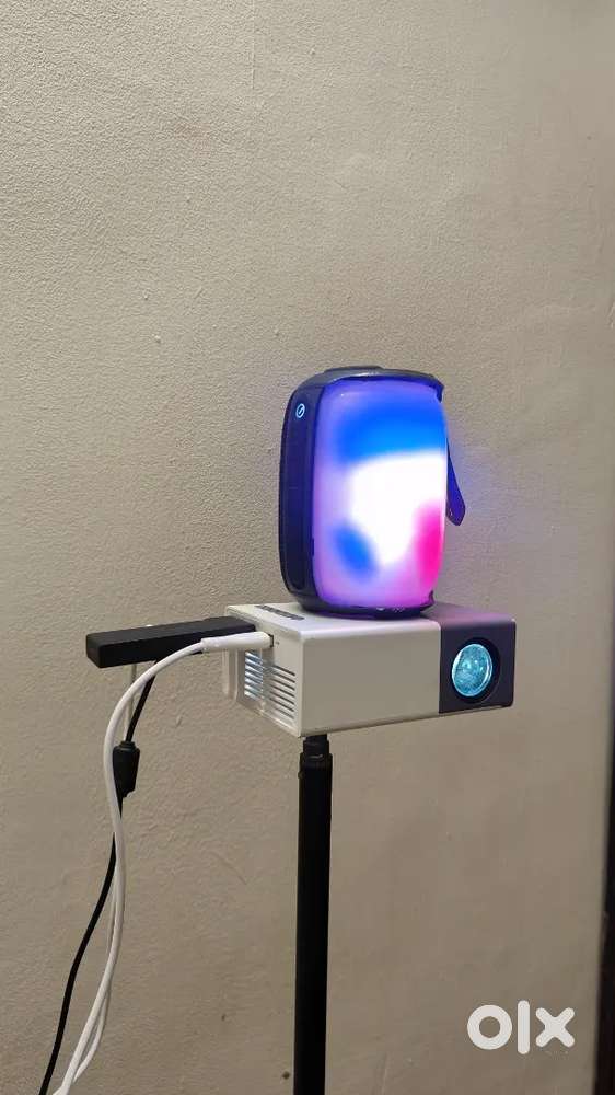 Projector with Fire stick and bluetooth speaker