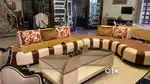 J shape sofa with center table