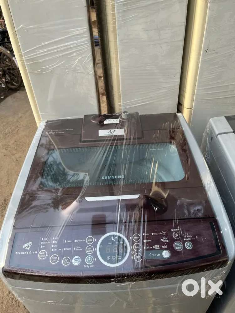 Washing machine automatic top load with warranty good condition