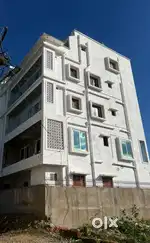 White hostel near link road