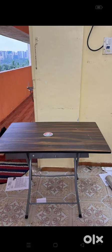Folding study table, cloth dryer and iron table