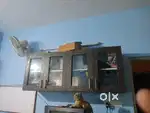 crockery unit made of ply & sofa & steel cot with  mattress for sale