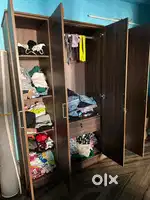 4 door wardrobe and 12 shelves with 1 internal bottom drawer and mirro