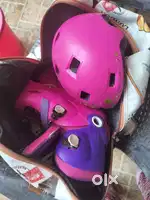 Pink Decath oxello Skate shoes with safety guard and helmet