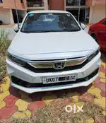 White Honda Amaze. Doctor's car