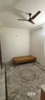 Room for single person with attached bathroom and kitchen.