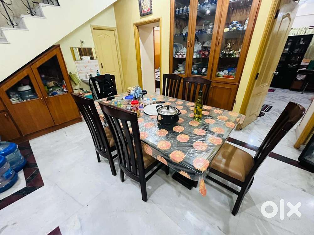 6 seater glass top dining table