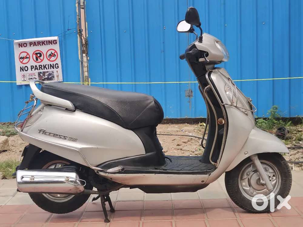 Suzuki access 125 cc single owner with self start showroom condition