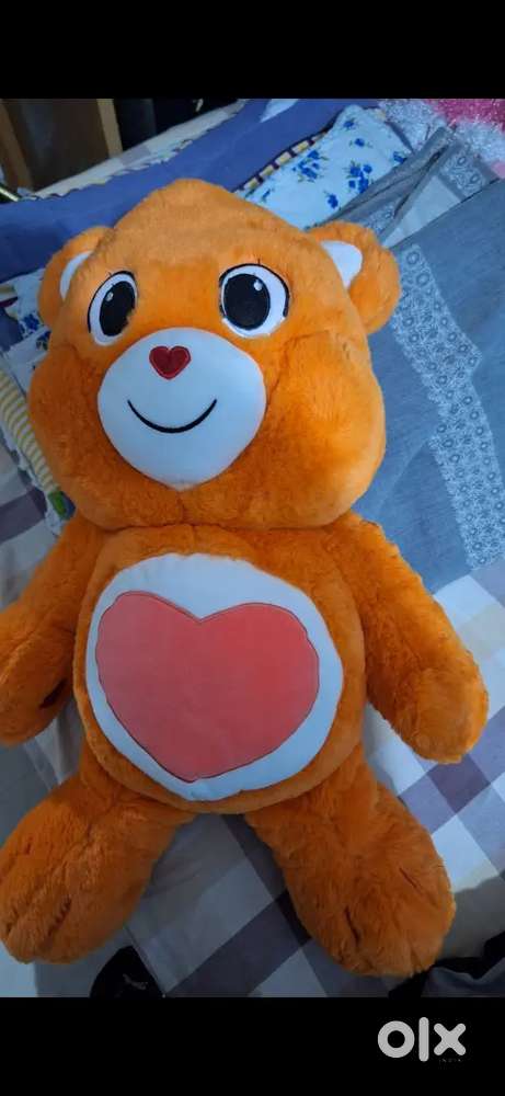 Cute orange teddy bear for kids & gifts.