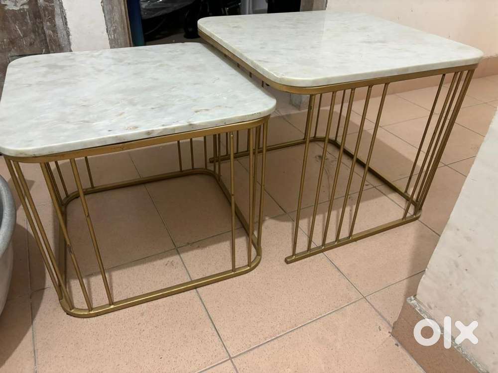 Nested metal central table