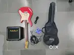 Electric guitar with kustom sound amp and accessories