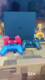 Playstation 4 slim edition 1tb with 3 controller and 8 game disc