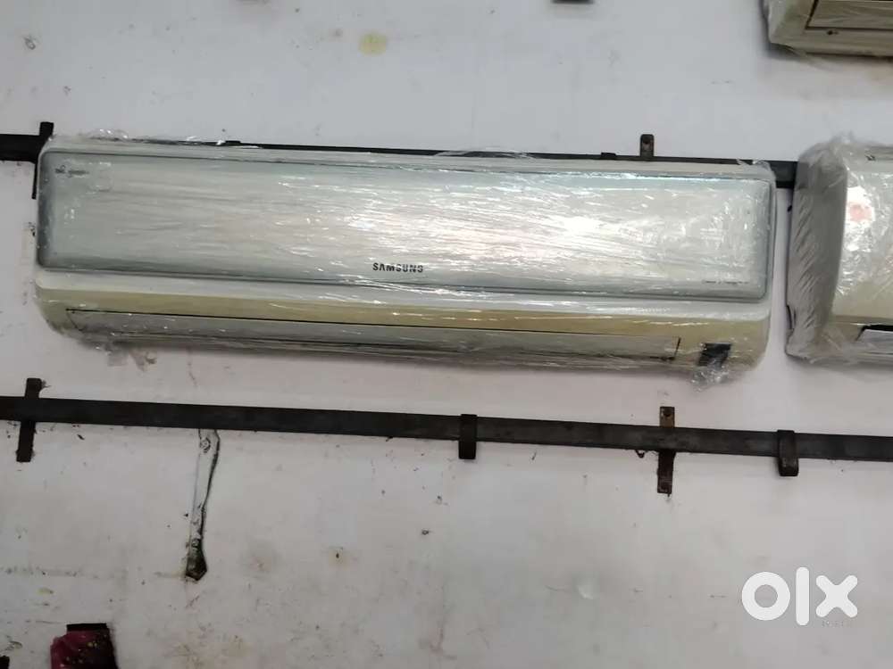 2 ton split AC good condition with warranty 1 year old