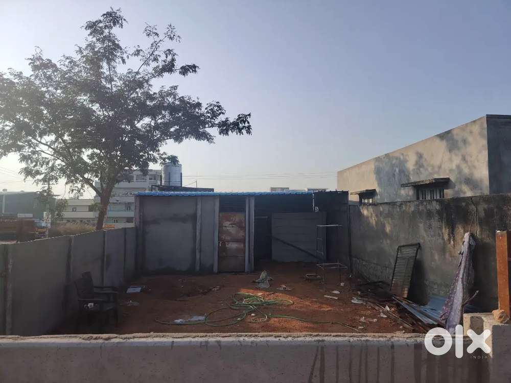 Land with one room and washroom, current and water. Godown, lease.