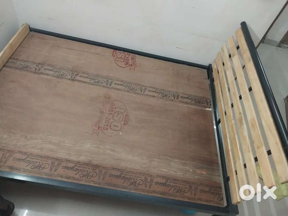 Good condition wooden Queen  cot and double steel cot  each @6000
