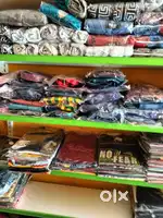 7 steel racks and wood table counters for sale