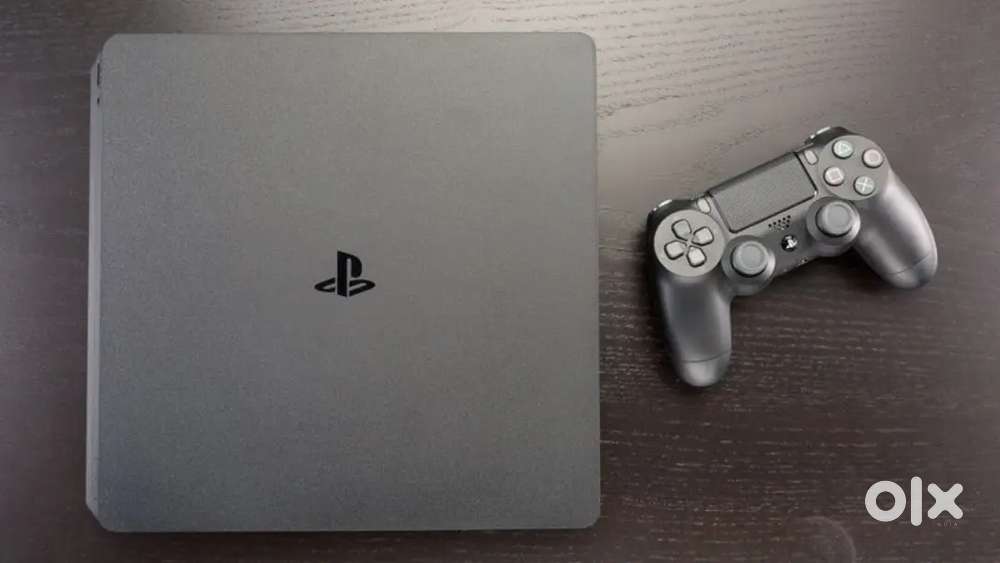 Ps4 slim with 5 game disks