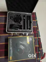 New mic or new headphones.