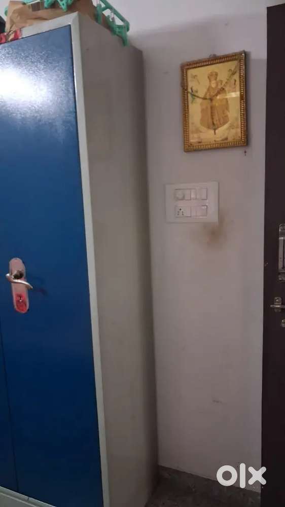 Two almirah.. One coat.. One iron table