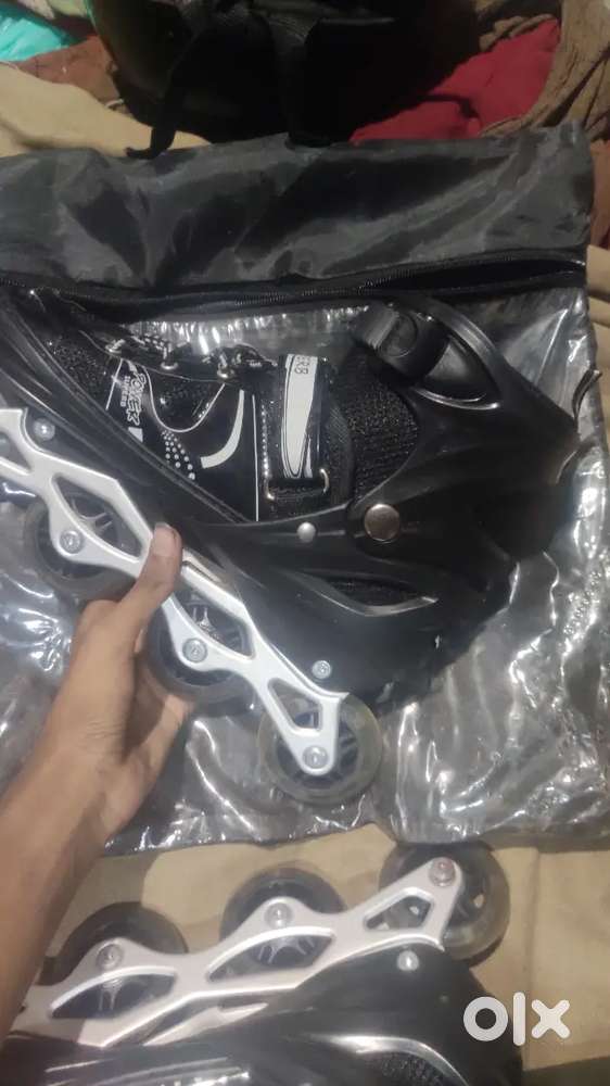 1 month old skate shoes with pads and helmet