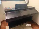 Sparingly used upright digital Piano for sale