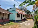 6.5 cent plot with house avinissery ollur, near railway station