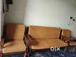 Wooden sofa and 2 chairs with pillows
