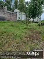 100 Gaj ka plot ha 12 feat ke road per