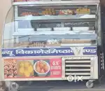Sweets counter and d fridge